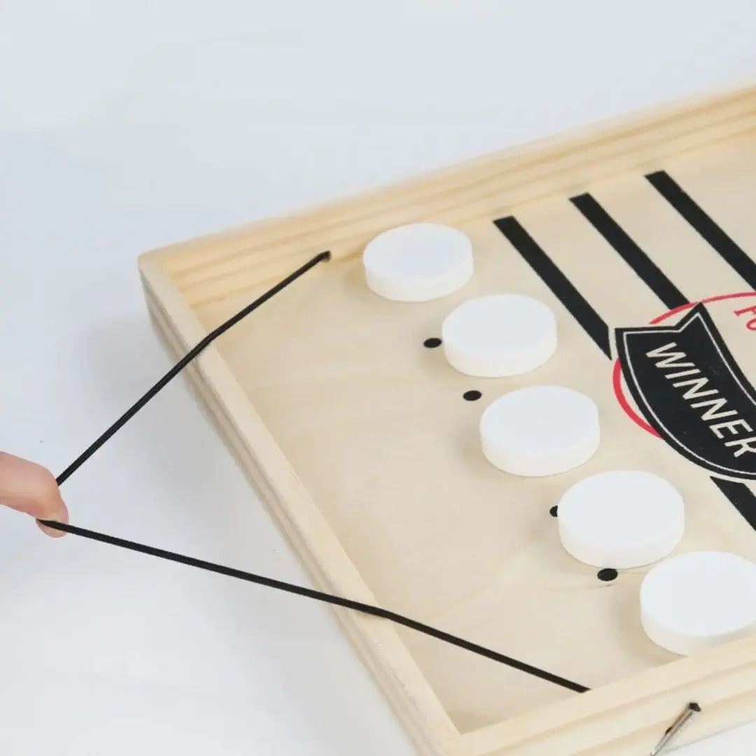 Le jeu qui connecte les familles - Family SlingPuck™ 